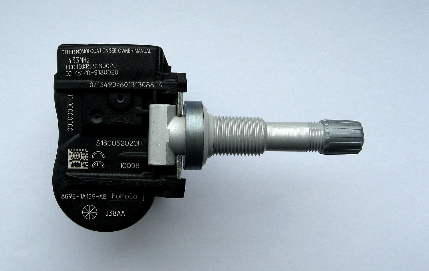 Tyre pressure monitoring sensor and small vehicle electronics on a workbench
